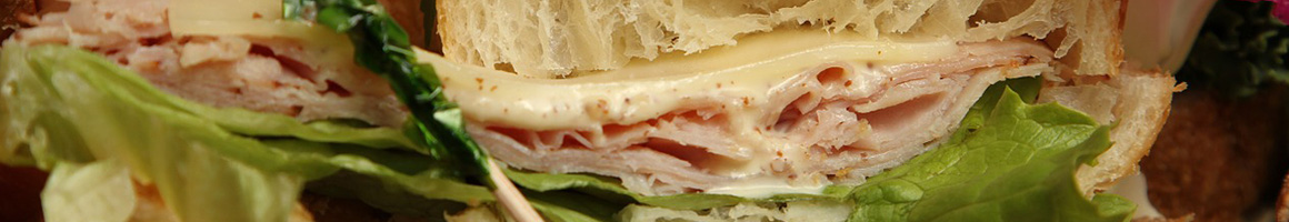 Eating Sandwich at Penn Lake Roast Beef restaurant in Bloomington, MN.
